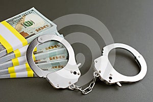 Money and handcuffs