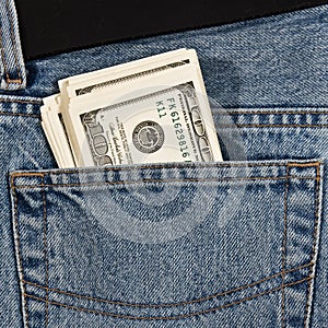 Money in hip-pocket of jeans