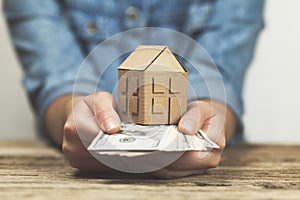 Money and a house in hand. Pledge for real estate, rental income. Home sales taxes