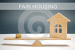 Money and house on the scales with the inscription Fair housing. Home appraisal. Property valuation. Housing evaluator. Fair trade