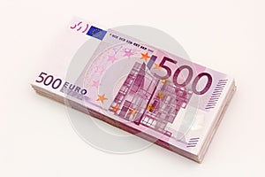 Money - Isolated stack of Five hundred euro bills banknotes with white background