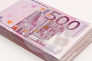 Money - Isolated stack of Five hundred euro bills banknotes with white background
