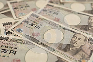 money Japanese notes. A bundle of bills. Background on the theme of banks, finance and the economy of Japan