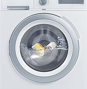 Money laundering. Two hundred euro banknote in washing machine