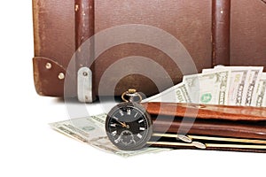 Money lays on an old suitcase photo
