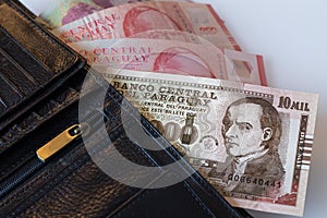 Paraguay banknotes, Guaranies sticking out of the wallet photo