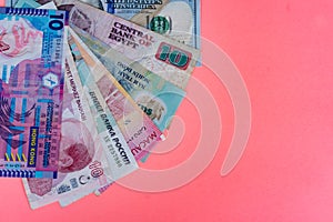Money on a pink background. photo