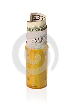 Money rolled up in Prescription container - Upright