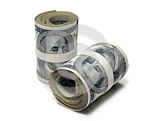 Money Rolls of One Hundred Dollar Bills on White Background
