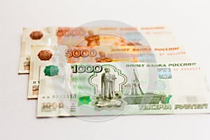 Money, Russian paper money, banknotes of different denominations on white background