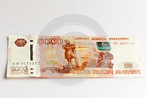 Money, Russian paper money, banknotes of different denominations on white background