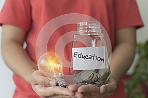 Money saving ideas for studying to succeed in life with light bulbs