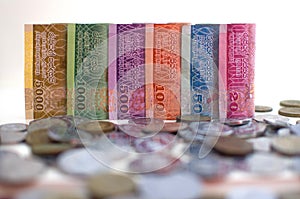 Money Sri Lankan  five thousand thousand five-hundred hundred fifty and twenty ruppee bills Pile of various currencies  on