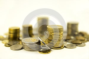Money, stack of coins on white background. Saving money concept. Growing business. Confidence in the future.