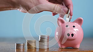 Money stack step growing money and piggy bank. Concept savings with piggy bank and stacked coins. Piggy bank between