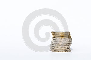 Money - stacked euro coins isolated on white background