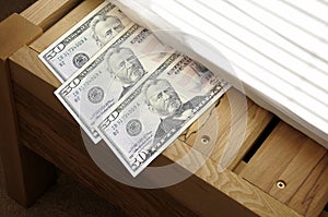 Money stashed under mattress