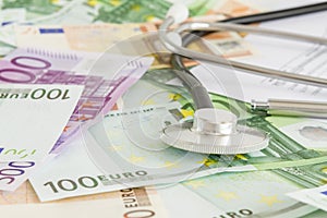 Money and stethoscope, medical insurance