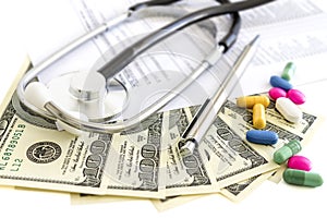 Money, stethoscope and pills, medical insurance