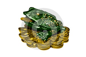 Money toad by Feng Shui on a white background.A money frog with a coin in its mouth.