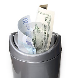 Money in trash bin