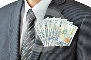 Money - United States dollar (USD) bills in businessman pocket