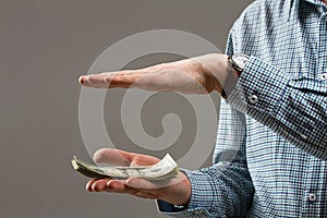 Money in your pocket. money in hands. Falling exchange rates. photo