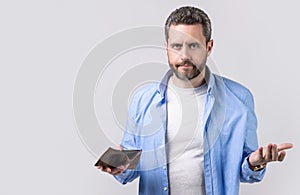 moneyless man with wallet at hand, copy space banner. photo of moneyless man with wallet.