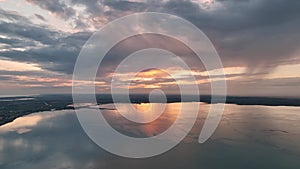 MONFALCONE, ITALY - APRIL, 2023: Sailing yacht moored off the coast Adriatic sea in Italy at sunset. Drone aerial view