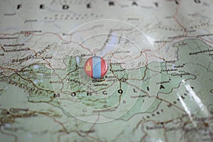 Mongolia flag drawing pin on the map