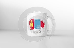 Mongolia flag on white coffee mug.