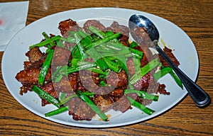 Mongolian beef in a white plate