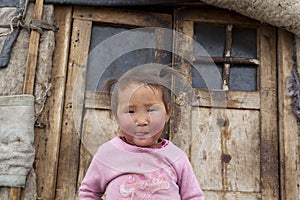 Mongolian child infront of Ger doors