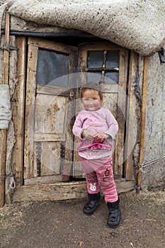 Mongolian child infront of Ger doors