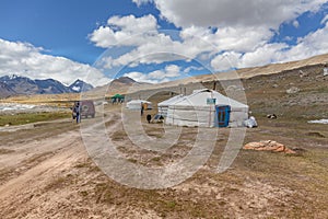 Mongolian dwelling on the green plain of grass