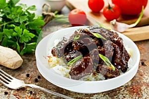 Mongolian meat - beef in sauce with spices