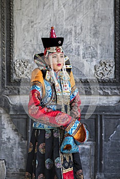 Mongolian woman in traditional outfit