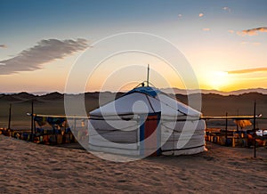 Mongolian yurt in the Sahara desert at sunset, Morocco. Generative AI