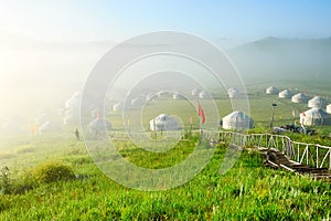 The mongolian yurts in the morning fog