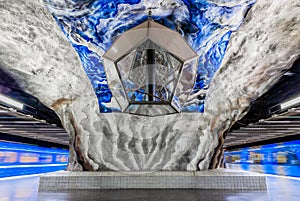 Moving train at Stockholm metro or tunnelbana station Tekniska H photo