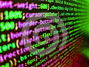 Monitor closeup of function source code. Letters, chars, and digits. Software developer programming code on computer monitor.