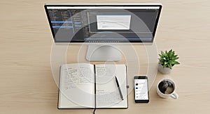 With a monitor displaying code on a software development interface