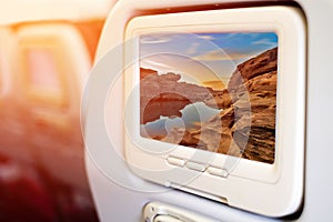 monitor in front of passenger seat showing Samphanboke Ubonratchatani Grand Canyon in Thailand, 3000 Boke