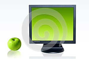 Monitor and green apple