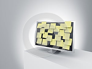Monitor on a podium with post it notes.