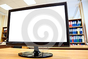 Monitor screen with white isolation standing on desk