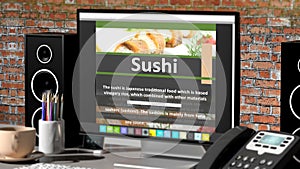 Monitor with Sushi recipe on desktop