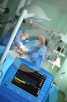 Monitoring patient heart activity during medical procedure.