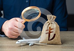 Monitoring the payment of taxes in the aviation industry and turkish lira money bag