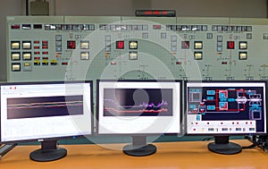 Monitors in a control room of a natural gas power plant